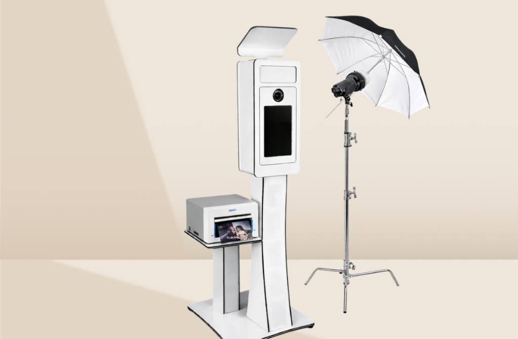 Open-air studio booth with branded backdrop at corporate conference